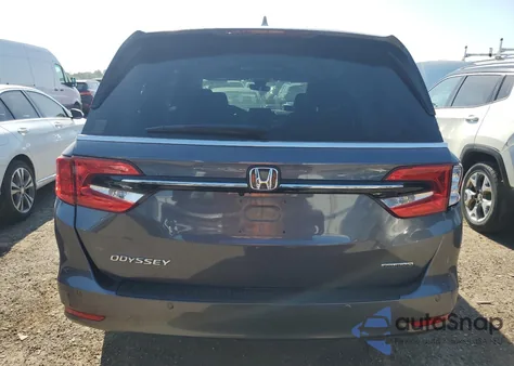 2021 Honda Odyssey Touring from USA, damaged, VIN 5FNRL6H8XMB030397